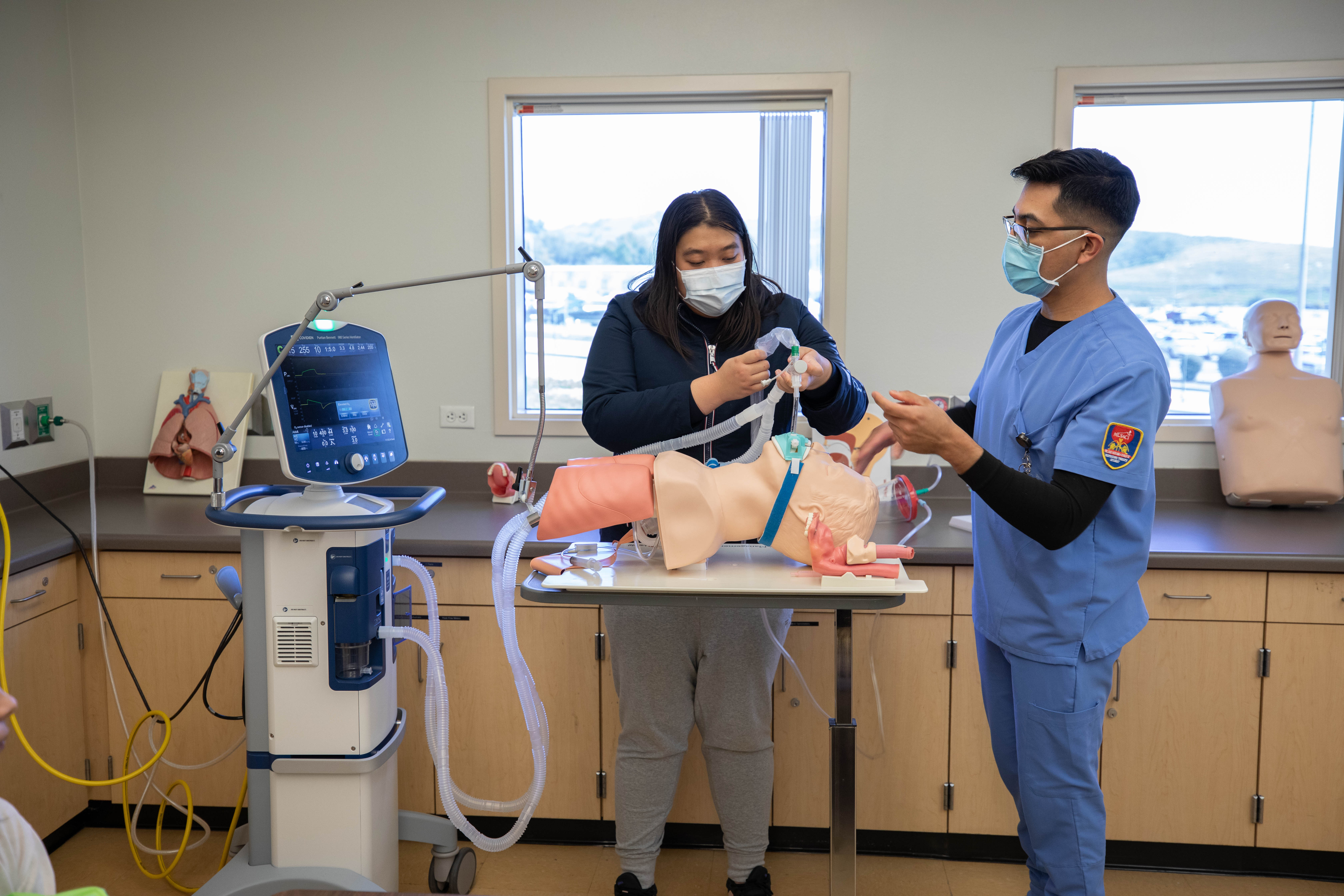 Students with respiratory machine